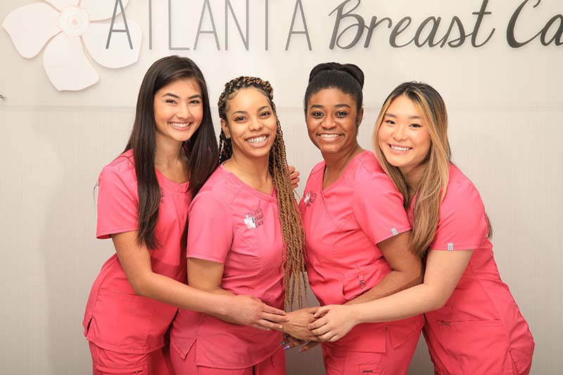 Four employees of Atlanta Breast Care